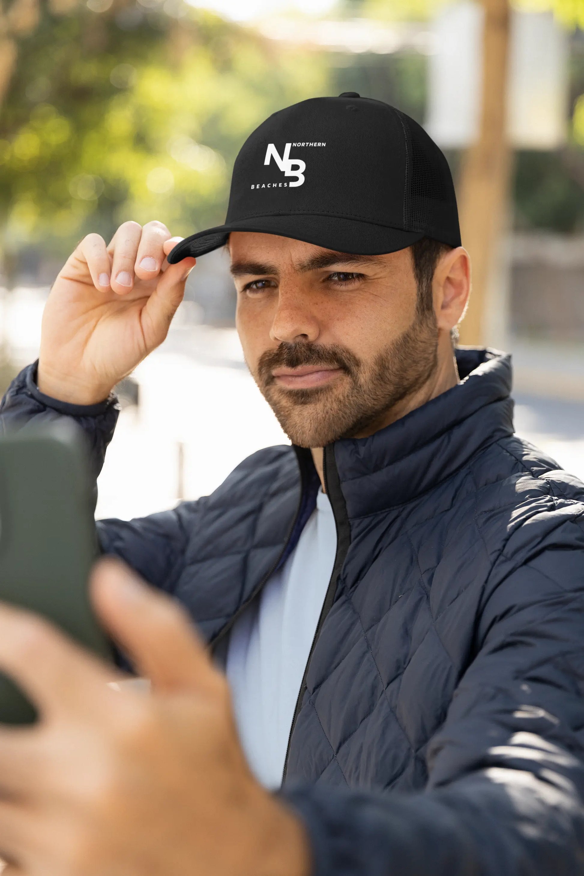 Hat Northern Beaches logo 